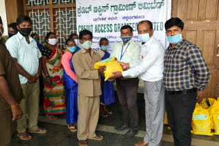 Distribution of food kit for civilian workers by Rural Cluster Micro Finance