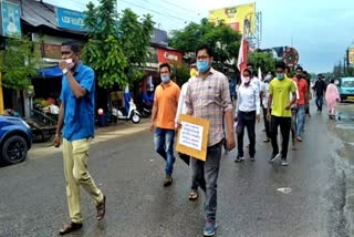 protest in biswanath by aasu