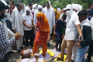 sacked pti teachers burnt effigy of sports minister sandeep singh