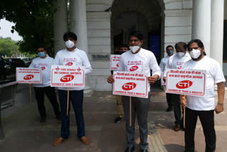 Chamber of Trade and Industries convenor Brijesh Goyal protested against China in Connaught Place