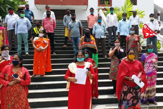 Protests by labor unions against Center  and State Govt