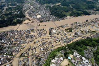 Heavy rain triggers mudslides in southern Japan