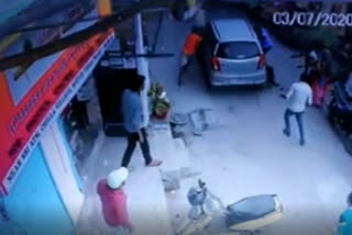 delhi cop hits woman with car arrested