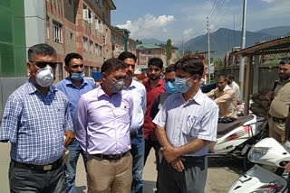 DDC Bandipora distributes scooty among disabled persons in Bandipora
