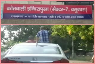 In ghaziabad 2 children are seated on roof of moving car