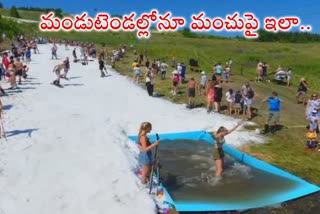 Russians enjoy summer skiing in artificial snow