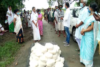 Relief Distribution By Jila Parishod Member Gahin Bora At Nao Baisa