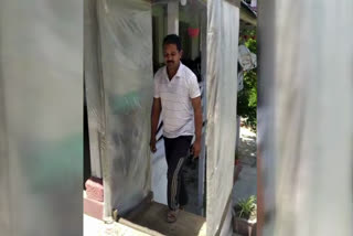 person made a sanitizer gate at house in karsog