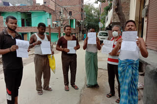 people face problem of water in c block of gauri shankar enclave of kirari