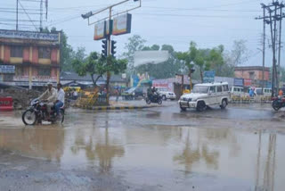 road logged with water post heavy rain in rewa