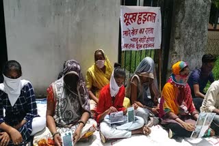 Farmer family sitting on strike