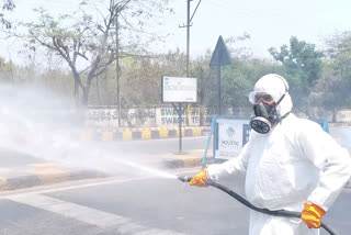 muslim youth sanitizing police vehicle