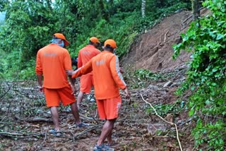 ndrf-team-cleared-pile-of-mud-on-the-road