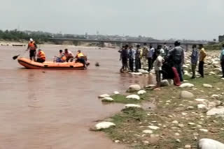 WOMAN RESCUED FROM TAWI RIVER