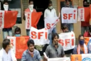 student leaders protest in front of deo office in nizamabad