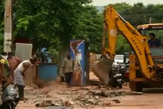 road side shops collapse in vizag maddilapalem route