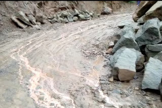 Water flowing between the road