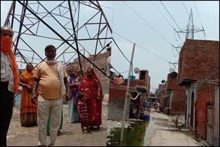 Bhagya Vihar people face problem of water logging and high tension wires on their houses