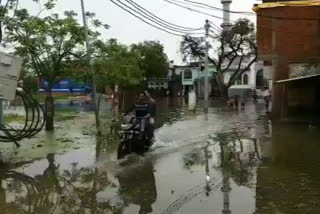 locals are disturbed by the accumulation of water on the road in ghosi