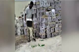 excise officers disposing of beer