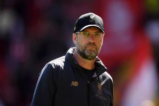 manager Jurgen Klopp, Liverpool captain Jordan Henderson