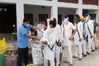Rations distributed by Sarbatt Da Bhala Trust to 100 families deprived of livelihood