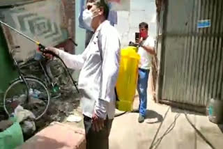 Congress workers sanitize slums of RK Puram on Saturday