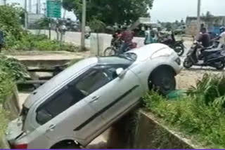 car fallen down into drainage in wanaparthi