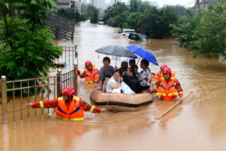 China reports over 140 dead or missing in floods