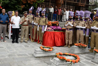 Khurshid Ahmad Ganai, Former Advisor to J&K Governor, and Baseer Ahmed Khan, Advisor to J&K Lt Governor paying floral tributes to July 31, 1931 martyrs'