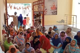 Women protest against forced collection of installments by private companies in barnala