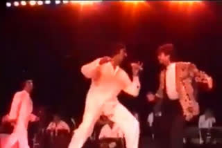 anil kapoor shares a throwback video from an on stage performance with amitabh bachchan captions praying for your speedy recovery