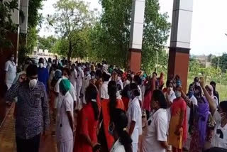 Government Hospital nurses stage protest against suspension of 2 nurses in Nellore