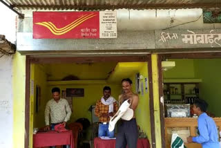 Husband doing work in place of women in post offices of rural areas