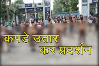Semi naked demonstration of workers