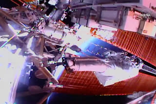 NASA astronauts conduct spacewalk to swap batteries