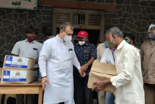 Groceries distribute by mla Mahesh kumatalli