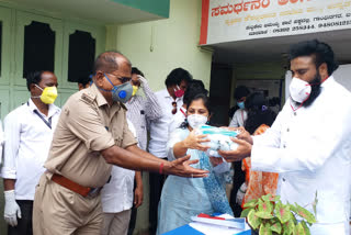 Mask, Sanitizer distributed by Minister B. Sriramulu