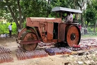 liquor-worth-rs-72-lakh-destroyed-under-road-roller-in-andhra-pradesh