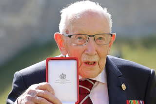 Queen Elizabeth II confers knighthood on 100-year-old fundraiser captain