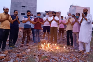 paid tribute to the dead buried in the rubble of the building for wo years ago