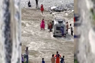 swollen river in Uttarkashi