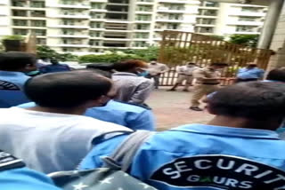 gaur city society security guards protested as they removed from job without notice