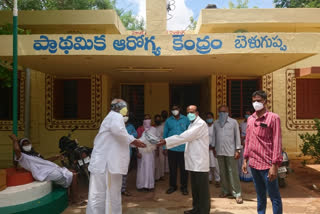 face helmets distributed by senior tdp leader in ananthapur district