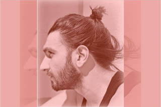 ranveer flaunts new hair do by deepika