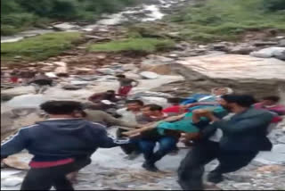 Patient carried to hospital on makeshift stretcher in Uttarakhand