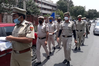 Police team patrolling the foot in Najafgarh Main Market