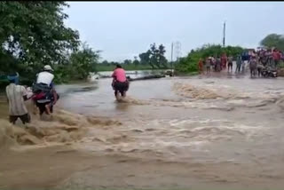 bridge overflow due to heavy rains