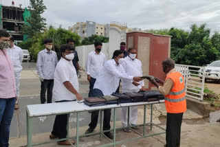 Distribution of raincoats on the occasion of KTR's birthday