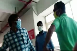 Doctor Rakesh Ahirwar attacking cameraman